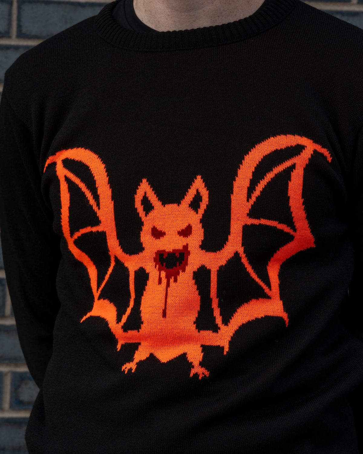 Orange Bat Jumper by Run and Fly